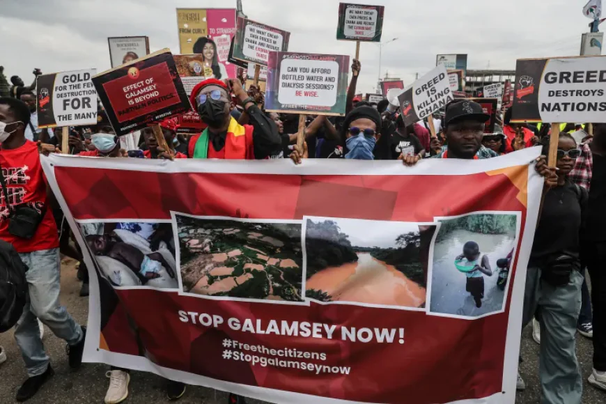 Protesters chant slogans and carry placards during a demonstration demanding government action on illegal gold mining, in Accra on October 3, 2024. Photocredit: Nipah Dennis/AFP