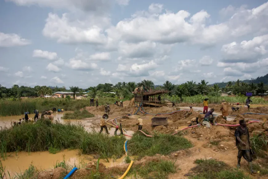A group of galamseyers, illegal or small-scale gold panners, work in Kibi, Ghana [File: Cristina Aldehuela/AFP]